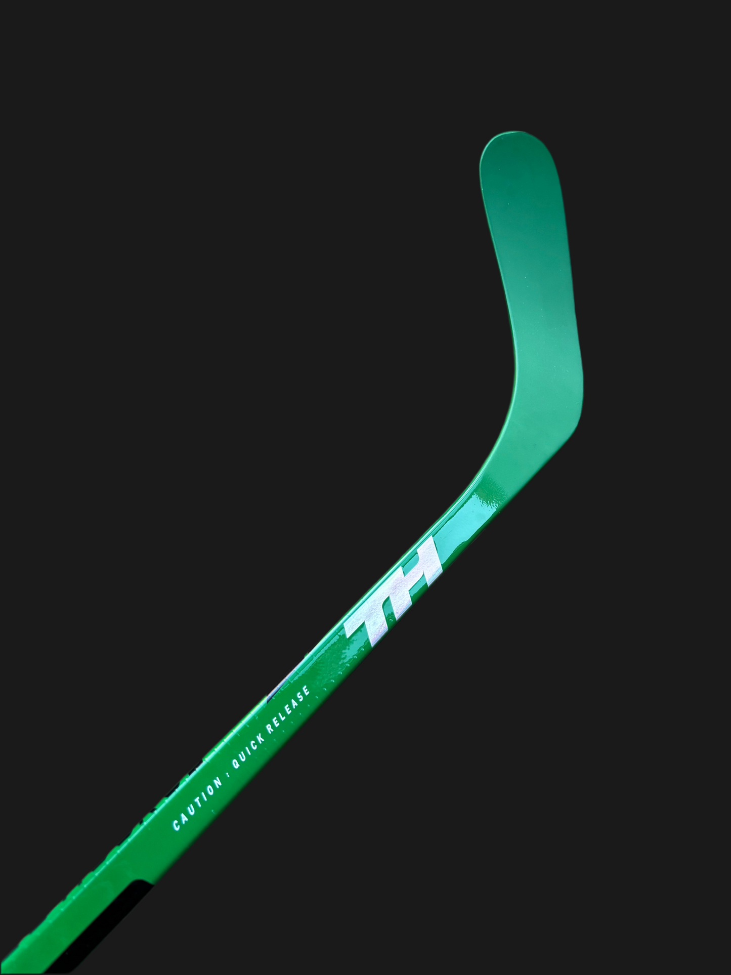 Green Taggs Hockey Stick